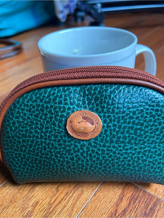 Dooney & Bourke Handbags - VINTAGE Dooney & Bourke Green Pebbled Leather Pouch with Tan Trim